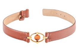 Lalique - a caviar leather belt, with the oval gilt buckle centred with a melon glass orb, signed an