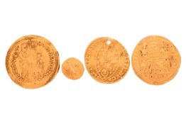 A Roman-style gold coin, together with two Venetian gold coins and a very small Roman-style Marium g
