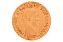 A Greek 1884 twenty drachma, gold coin, 6.4 grams, 20 mm diameter.