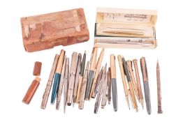 A large group of Parker pens and other mechanical pencils and pens, comprising four rolled gold capp