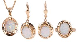 A synthetic opal suite comprising a ring, a pendant on chain, and a pair of drop earrings; of Greek 