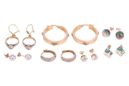 A group of earrings, to include; a pair of 9ct hollow hoop earrings set with CZs, diameter 1.4cm; a 