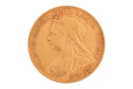 An 1899 Queen Victoria full sovereign, veiled head to the left, 7.9 grams.