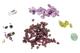 A quantity of loose gemstones, to include a 13.10ct emerald oval cabochon, a 9.59ct cushion-cut aqua