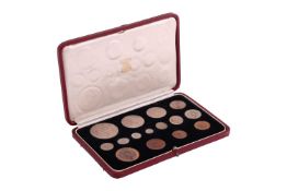 A King George VI, 1937, fifteen specimen coin set, including Maundy money, in a fitted gilt tooled r