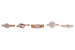 A group of five diamond-set rings; The first a diamond cluster ring, comprising a central cluster of