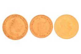 A collection of three Austro/Hungarian gold coins, including a 1907 Hungarian ten korona, 1893/1915 