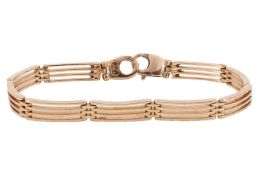 A gate link bracelet in 9ct gold, comprising a series of curved gate links, completed with a stylise