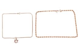 Two 9ct gold chains and a star of David pendant; the 9ct gold star pendant with bark effect texture 