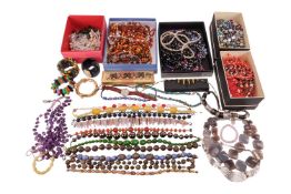 A large quantity of costume jewellery; to include various beaded necklaces of freshwater and imitati