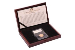 A 1957 Queen Elizabeth II Sovereign, (the first QEII issued Sovereign), in capsule with outer presen