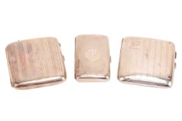 A silver cigarette case, rounded rectangular, with banded engine-turning and a monogram to centre, B