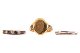 Three rings; to include an 18ct yellow gold signet ring in size O, a 9ct gold diamond and sapphire h