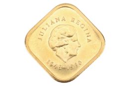 A 300 Guilder gold coin, 1980, of square section. 5.5 grams, 12 mm square.