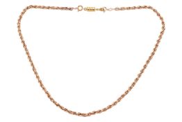 A twisted rope link chain in 9ct yellow gold, British hallmarks, fastens with a base metal magnetic 