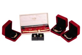 Three gilt metal and paste bangle cocktail watches, two with concealed dials, together with two cock