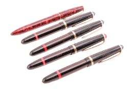 A collection of five cased ink pens: four Rotring Tiku specials with the Red Ring; together with one