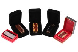 A small collection of Cartier and one other gas cigarette lighters, including a Sterling silver GANH