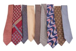 A collection of nine designer silk ties; including four Hermès patterned ties, a Paul Smith jacquard