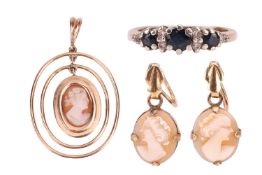A small group of jewellery items comprising a 9ct gold sapphire and diamond ring, size G1/2, a shell