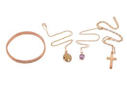 A small group of jewellery items comprising a 9ct gold round bangle, the inner diameter measuring ap