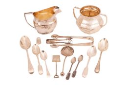 A George III-style silver creamer, Chester 1907 by Nathan & Hayes, with astragal moulded harp ha