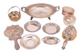 An agglomeration of German (800) early 20th-century silver items, including an oval two-handled frui