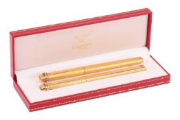 Les Muste de Cartier of Paris, a cased gold-plated 