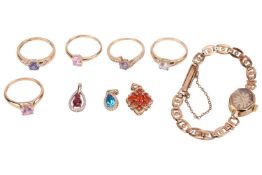 A small collection of 9ct gold gem-set jewellery items and a watch; to include a ruby and diamond cl