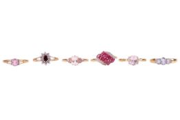 Six 9ct gold dress rings set with pink coloured gemstones; including a morganite cluster ring in siz