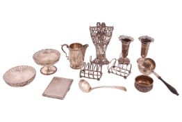 An agglomeration of silver items, including a pair of pedestal sweet meat dishes, Sheffield 1932 by 