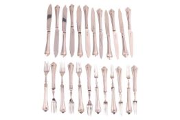 A set of six Edwardian silver fruit eaters and a matching set of six silver fish eaters. Hollow hand