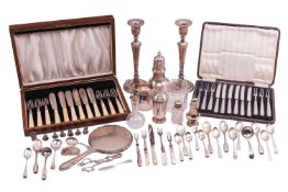 A pair of candlesticks, circular with beaded border and loaded bases, Birmingham 1989, 27cm high; to