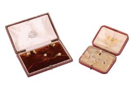 Two Victorian cased gentleman’s dress sets, of button design; the first in yellow metal marked ‘15’,