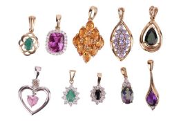A group of ten gem-set pendants; to include a pink sapphire and CZ halo pendant in 14ct gold, a citr