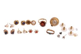 A pair of sapphire and diamond earrings, the oval cut diamonds within a surround of baguette and rou