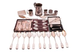 A heavy gauge silver tankard with a presentation inscription dated 1937, a silver cigarette case, na