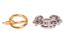 Hermès - two scarf rings; including a silver-tone plated 'Regate' scarf ring, and another of yellow-