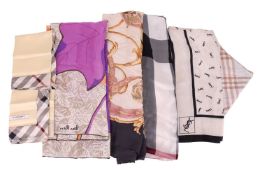 A collection of six designer scarves; comprising a Burberry silk scarf in butter yellow and tartan b