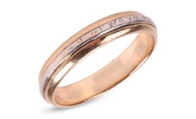 A two-toned wedding band, the D-profile band with a protruding band with engraved details, unmarked 