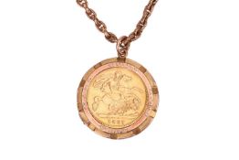 An 1897 Victorian half sovereign in pendant mount, in an indented surround and with suspension loop 