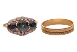 A wedding band and a half-hoop ring; The wedding band in 18ct yellow gold, of grooved form, engraved