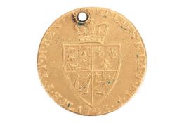 A George III 1793 Gold Spade Guinea, (drilled) 8.1 grams, 24 mm diameter