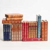 A group of leather bound books, one signed by Joseph Heller