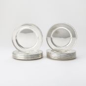 Set of Twelve Tiffany & Co. and Set of Eight Cartier Sterling Silver Bread Plates