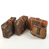 Group of Three Louis Vuitton Monogram Suitcases Together with a Gucci Monogram Coated Canvas Overnig