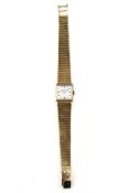 Omega Damenarmbanduhr. Ca. 17mm, 750er Gelbgold, Handaufzug. Silberfarbenes Zifferblatt mit