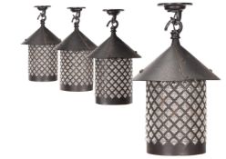 A SET OF FOUR RUSTIC PENDANT LANTERNS, 20TH CENTURY