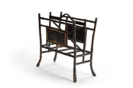 AN AESTHETIC MOVEMENT MAGAZINE RACK, CIRCA 1890