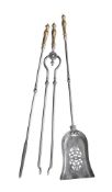 A SET OF THREE REGENCY BRASS HANDLED STEEL FIRE TOOLS, EARLY 19TH CENTURY